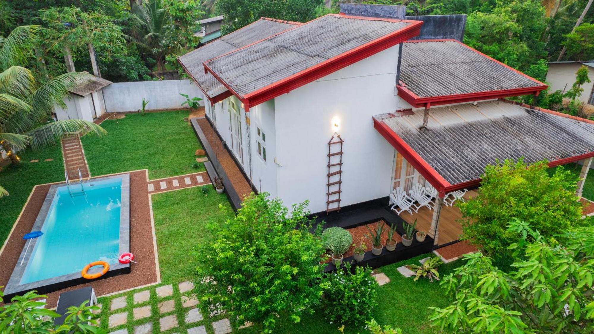 Villa Tropical Oasis บาลาปิตียา ภายนอก รูปภาพ